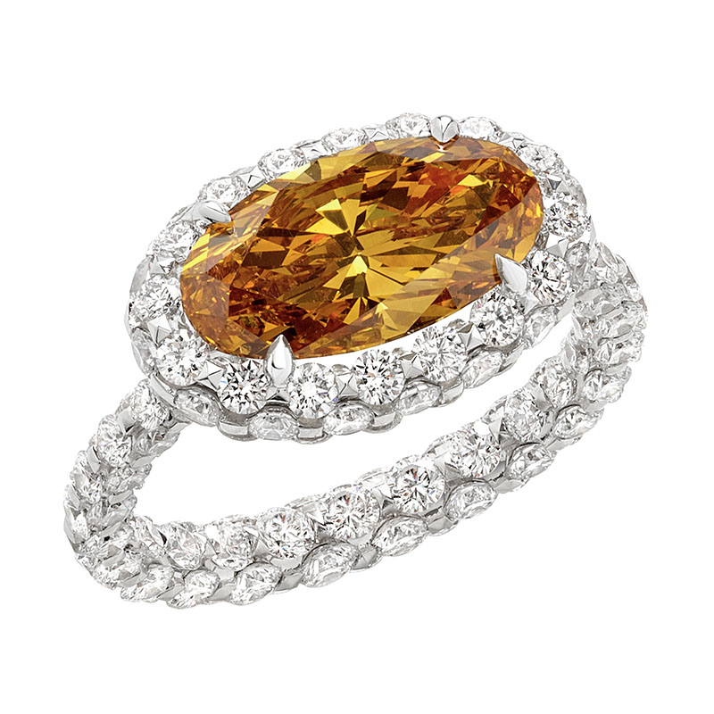 Bague de Merveilles avec un diamant jaune orangé profond et des diamants blancs