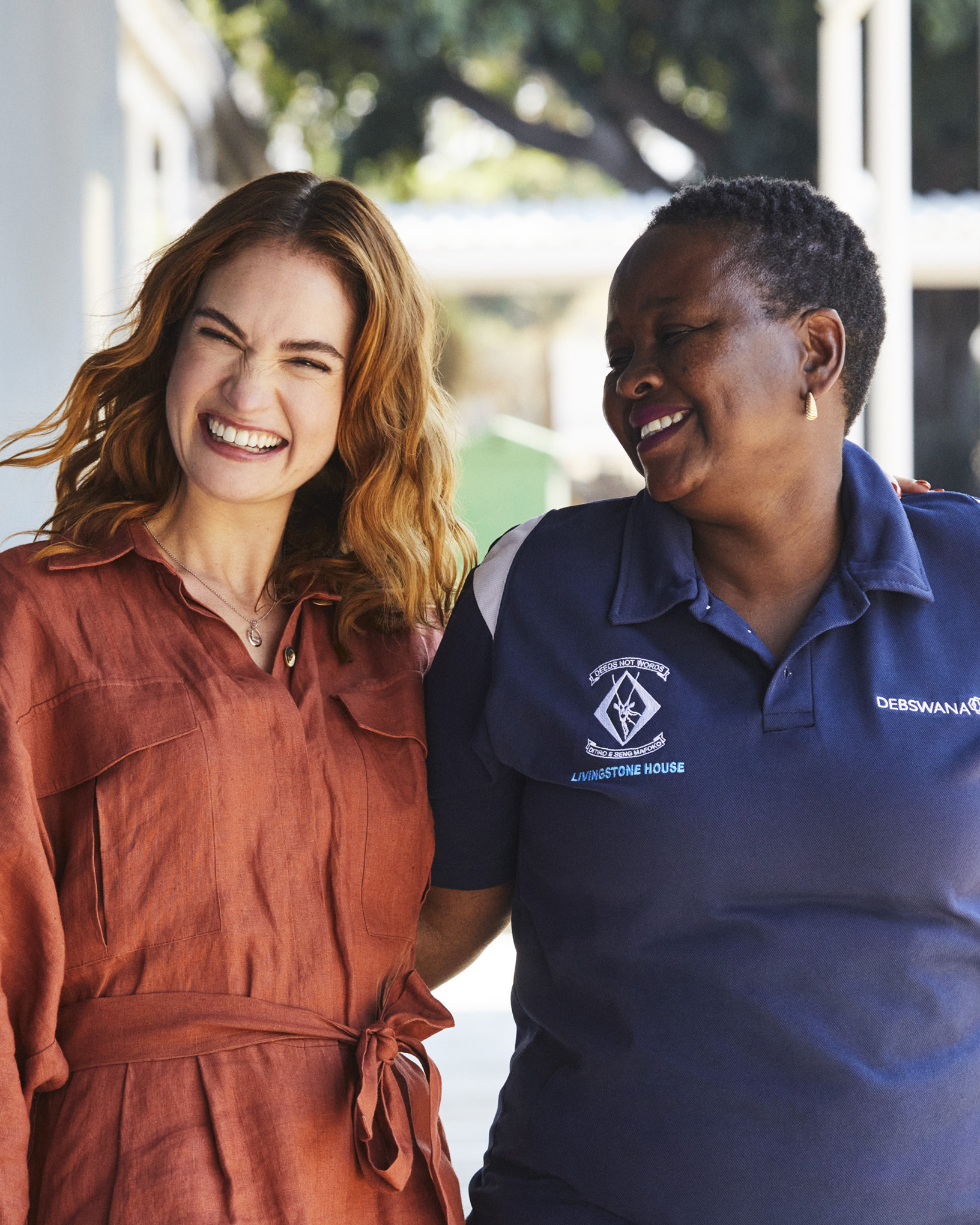 Lily James and Livingstone House Primary School teacher Emily Mompe