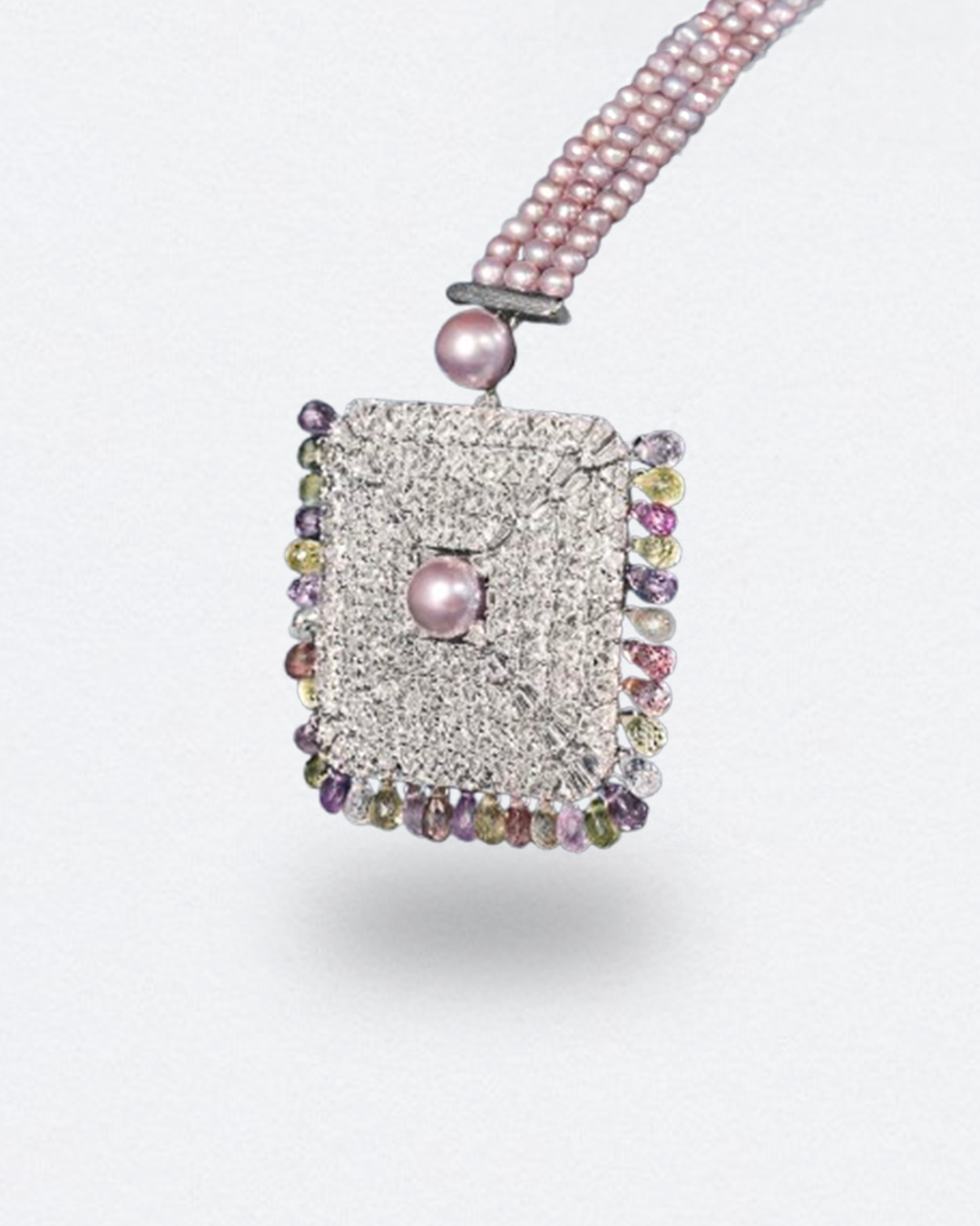 Maang tikka featuring a colored pearls and diamonds