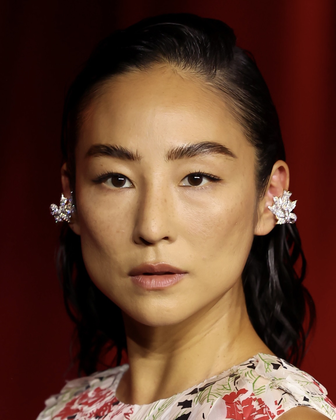 Greta Lee attends the 2024 Academy Museum Gala in Tiffany & Co. diamond jewelry.